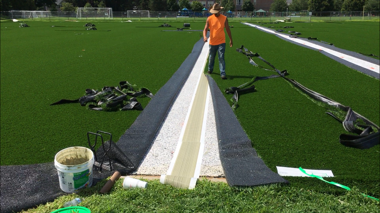 Laying the Carpet over the Tape (figure 10)