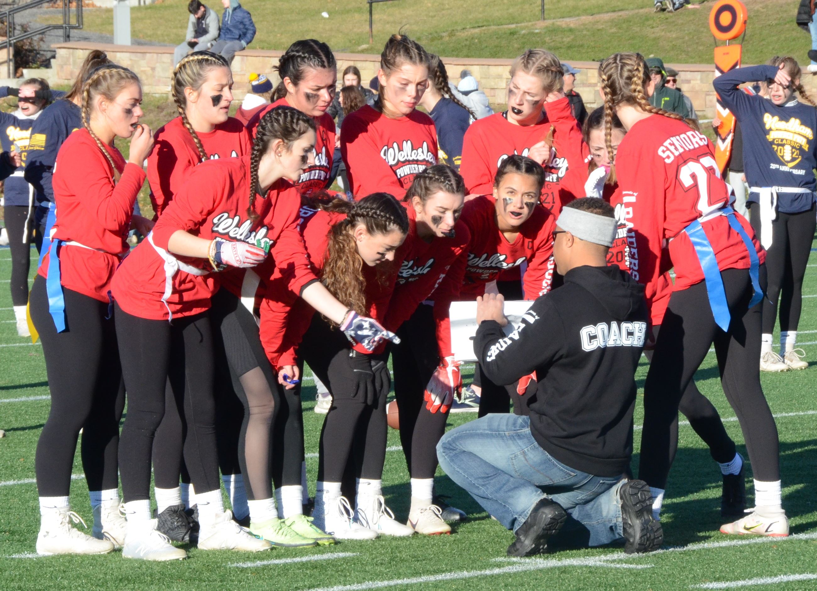 Sgt. Griffin goes over the play for the team.